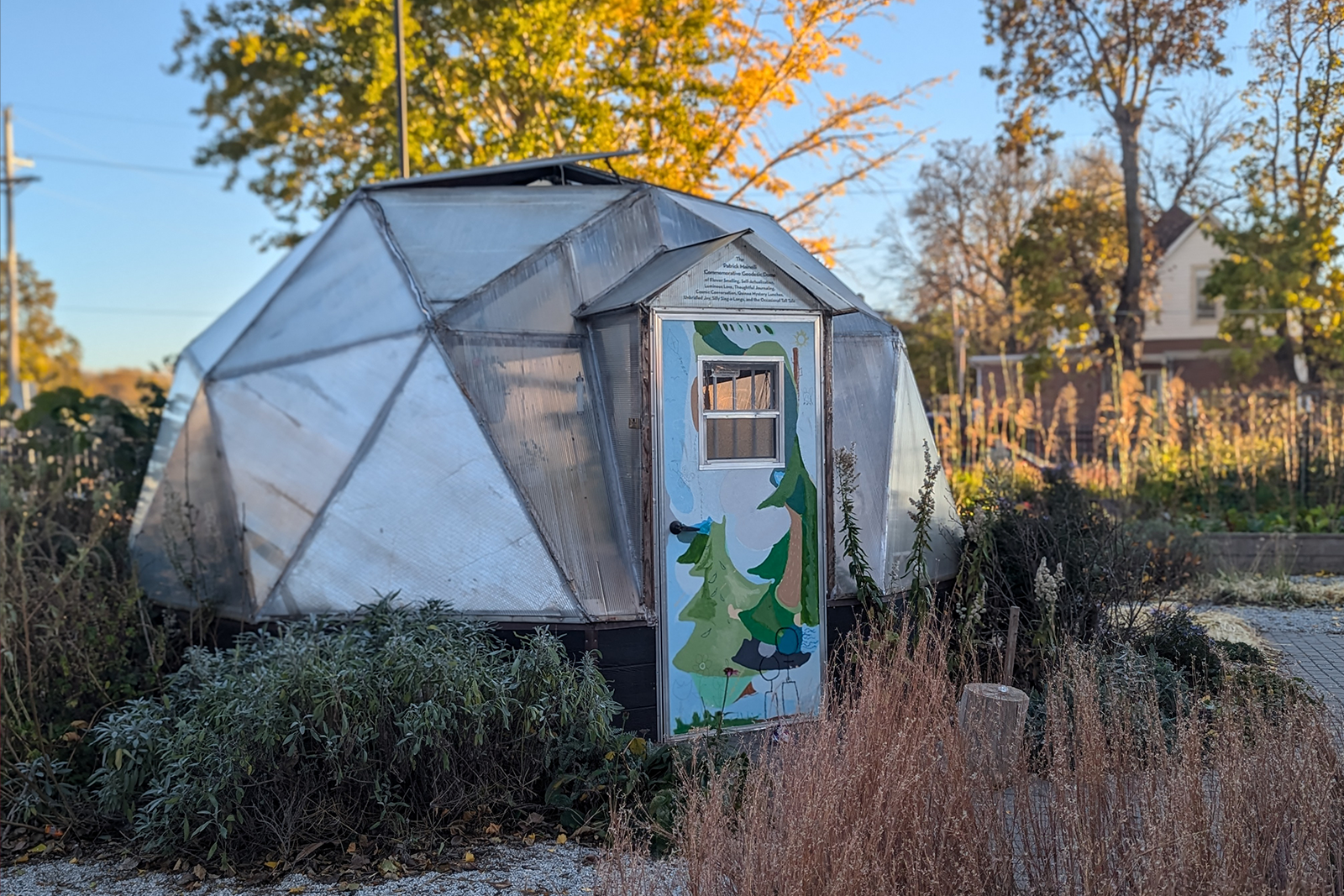 A photo of the abundance garden dome at sunset in the fall