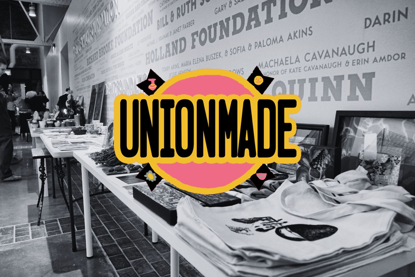 Union Made grpahic logo overlaid on a photo of artist goods laid out on tables in The Union