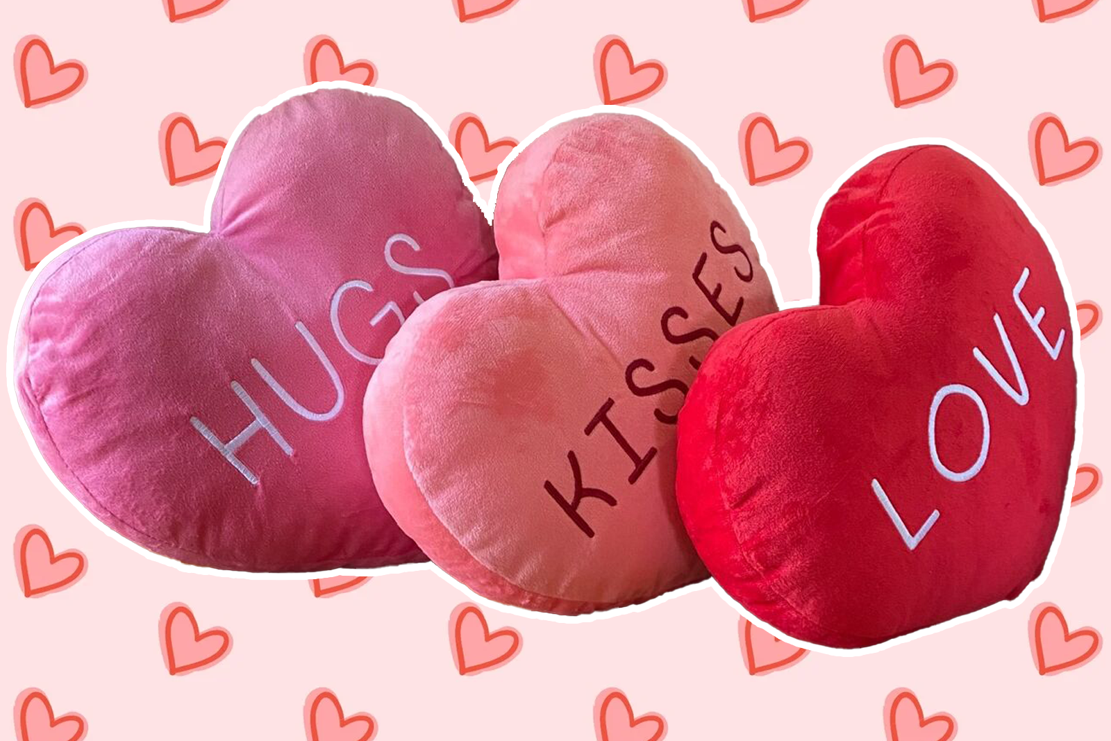 Valentines Conversation Heart Pillows Happenings three pillows against a hearts background they say hugs kisses and love