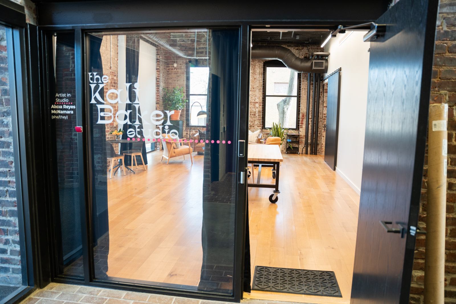 View from the hallway looking into the large window and open door to the Kali Baker Studio