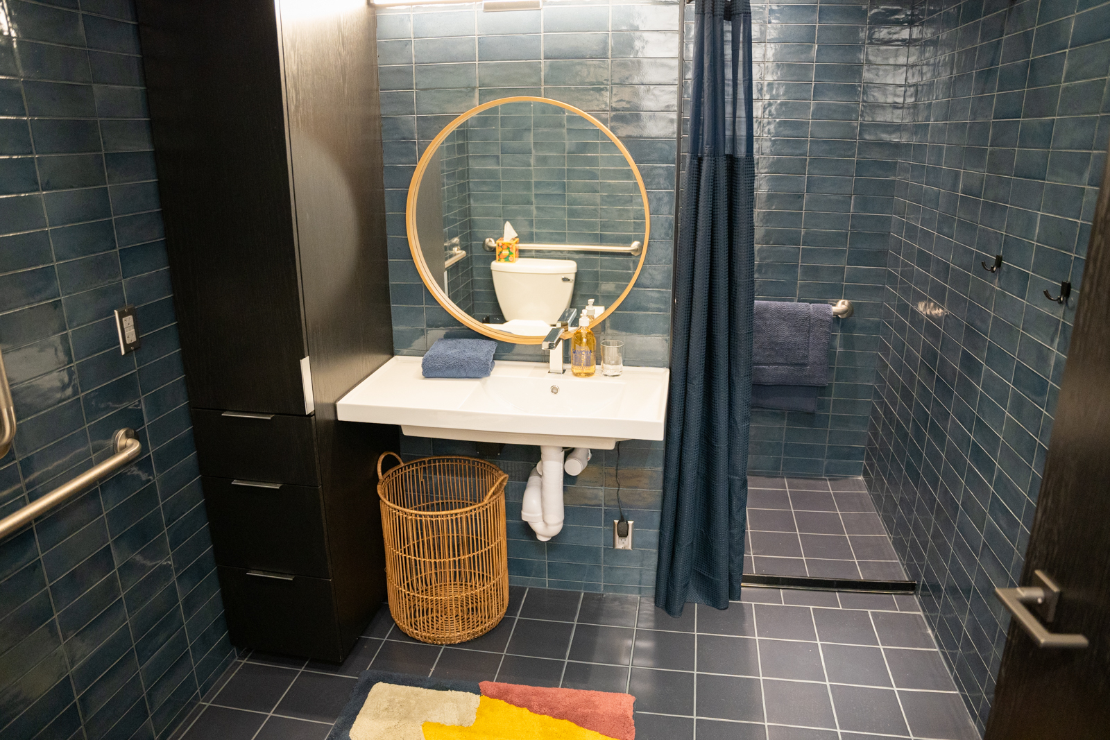 View of the vanity and shower in the studio